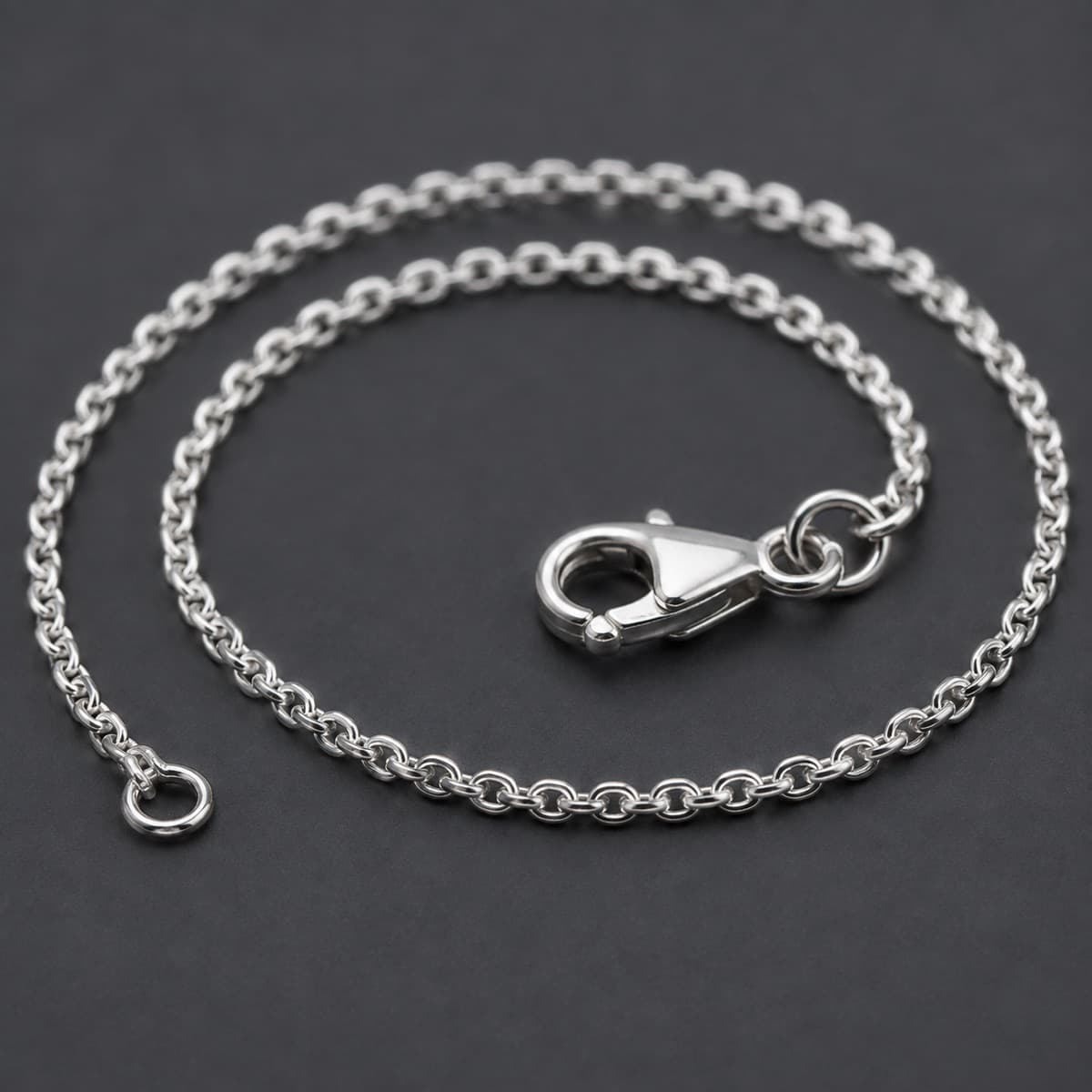 Chain Bracelet Fine 1.5 mm in solid 925 sterling silver, photographed against a dark grey background