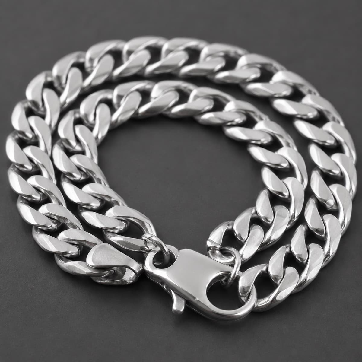 Curb Bracelet 3 mm in solid 925 sterling silver, photographed against a dark grey background
