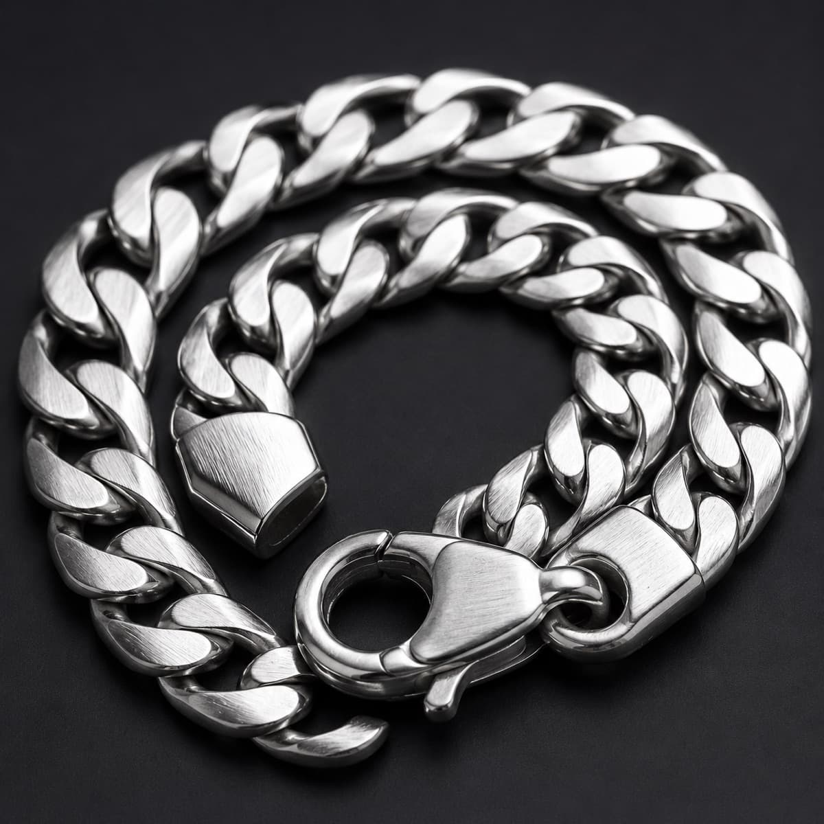 Curb Bracelet 5 mm in solid 925 sterling silver, photographed against a dark grey background